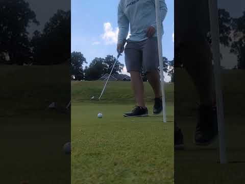 Taking a birdie putt that did not break at all, and a massive slider par putt