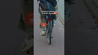 hahaha "baby on bike" is just too cute 😆😆cycling in Amste...