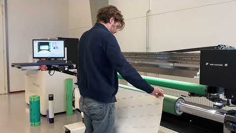 Sleeve tape application on the TIR Sleeve Measurement System | AV Flexologic