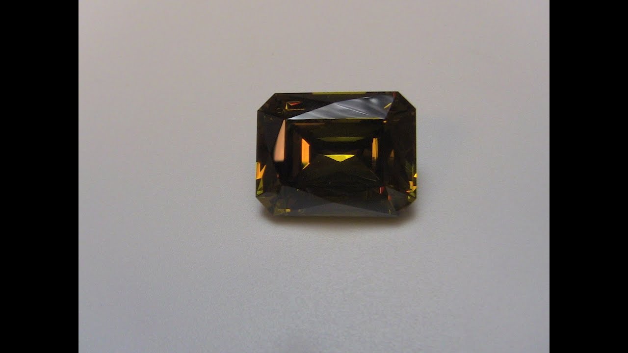 Gemstone  faceting:   cutting an emerald cut
