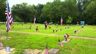 Tyler Boy Scouts plant flags on graves of veterans
