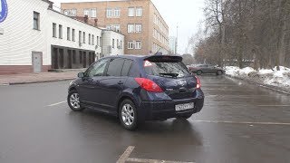 : Nissan Tiida -   .