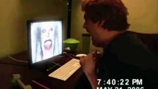 guy gets scared and breaks his computer screen funny