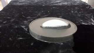 Ice Melts from the Sun's Thermal Energy. Demonstration of Phase Change from Solid to Liquid.