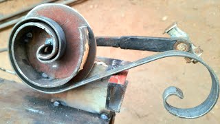 Converting scrap into an iron bending tool in the form of an ornament