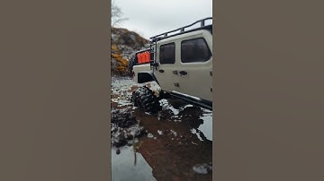rainy days 🌧️#pnw #axial #scx24 #gladiator #rccrawler #trailrun #valhalla #river #makeaway
