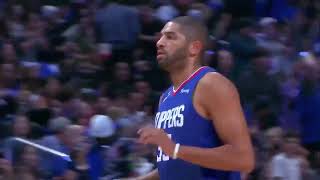 Nicolas Batum hits the half court shot to beat the buzzer and end the first quarter for the Clippers