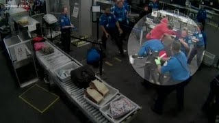 Surveillance video shows man attacking TSA officers