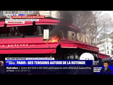 Retraites: départ de feu sur la devanture de La Rotonde lors de la manifestation à Paris