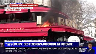 Retraites: départ de feu sur la devanture de La Rotonde lors de la manifestation à Paris