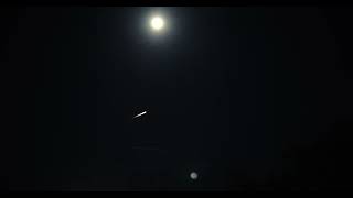Rocket Launch Under Moonlight