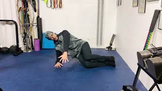Side Plank with Hip Shift and Reach