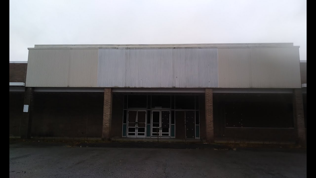 Abandoned Acme grocery store and abandoned Ames department store