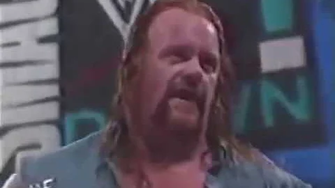 The Rock helps The Undertaker from Kane and Chris Benoit attack