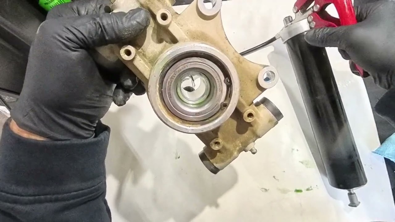 Wheel bearing greasing tool use for UForce 1000 