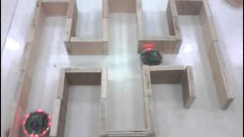 Two E-Pucks Solving A Maze Using Master-Slave Guider