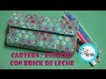 CARTERA/ESTUCHE CON BRICK DE LECHE