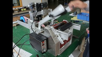 Testing video of semi automatic labeling machine with coding function,for round samll glass vial ,gl