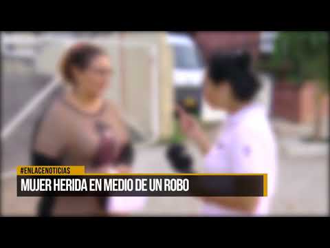 Mujer herida en  medio de un robo