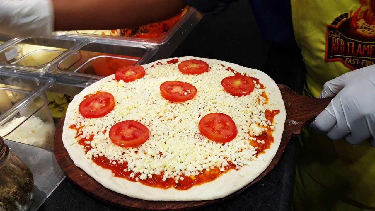 How do they make Pizzas in Restaurants ? Watch it live making Pizza - Red Flames Pizzeria | Tasty Street Food