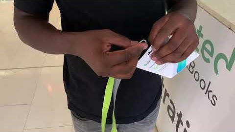 Attaching lanyard to name badge - Digital Touch Event Expo Registration Solutions in South Africa