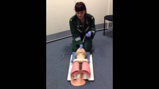 Using a Laryngoscope and Magill's Forcepts
