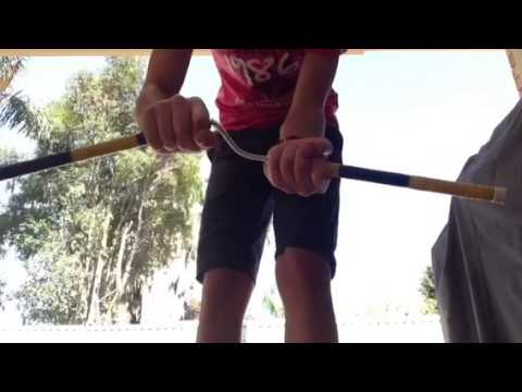 The Flying Black Belt - Nunchuck Tutorial Episode 1 - Basic Wrist Roll and Rip Roll