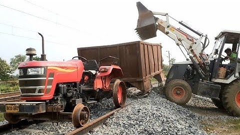 Mahindra yuvo 415DI tractor And JCB 3DX Going to another village for work,tractor running like train