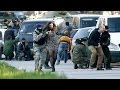 Russian forces storm Ukraine's Crimea bases