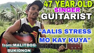 47 YEARS OLD SINGER GUITARIST from Malitbog Bukidnon