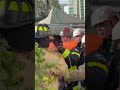Survivor hugs Miami firefighter after rig collapse in  Brickell