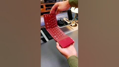 foldable Bluetooth keyboard with a touchpad and numeric keypad