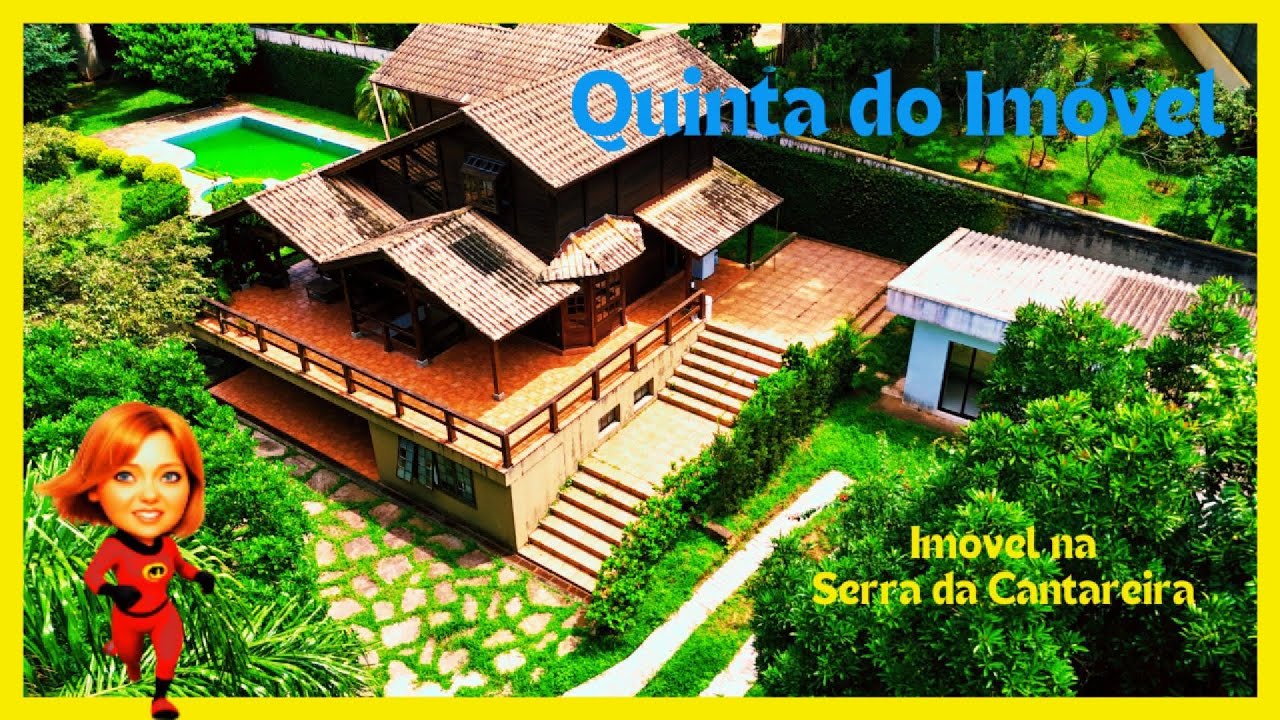 Casa na Serra da Cantareira no condomínio Sausalito em estilo Serrano em terreno plano.