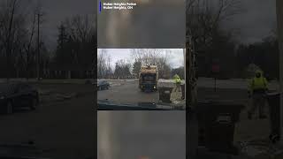 Sanitation worker finds suspect hiding in garbage bin