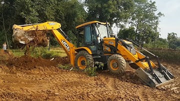 JCB Backhoe Machine Pulling Out Tree Root - JCB Cleaning and Leveling Agro Field