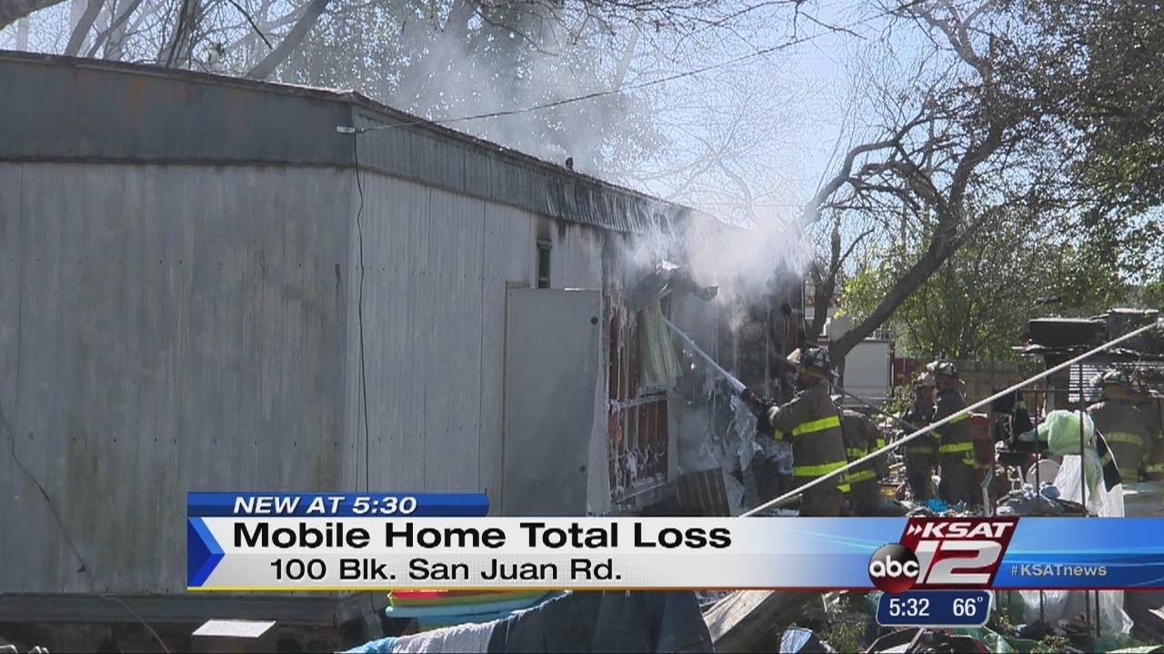 Fire destroys mobile home on SE Side - YouTube