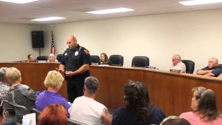 Chief Davis escorts Citizens from Chamber after City Attorney Fired