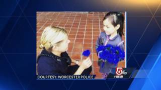 5 For Good: Young girl hands out blue flowers to police
