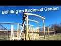 Building an Enclosed Garden ➠ Raised Beds + Arbors