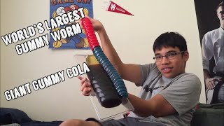 An Asian Kid Eats The World’s Largest Gummy Worm And A Giant Gummy Cola Bottle