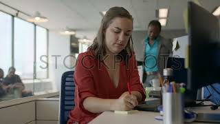 A Young Woman Programmer Is Hard At Work At A Tech Company Creating The Next Big App.