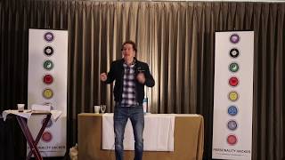 Dr. Dario Nardi Author of Neuroscience of Personality Demonstrating Brain Scan Headset