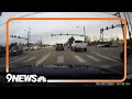 RAW: Dash camera captures driver shooting at another driver on busy Denver roadway image