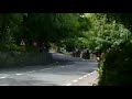 CAMERA MAN REACTION TO CRAZY INSANE FOOTAGE ISLE OF MAN TT SIDECARS FLAT OUT SPEED THROUGH MILNTOWN.