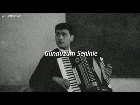 Ferdi Özbeğen - Gündüzüm Seninle ( Lyrics )