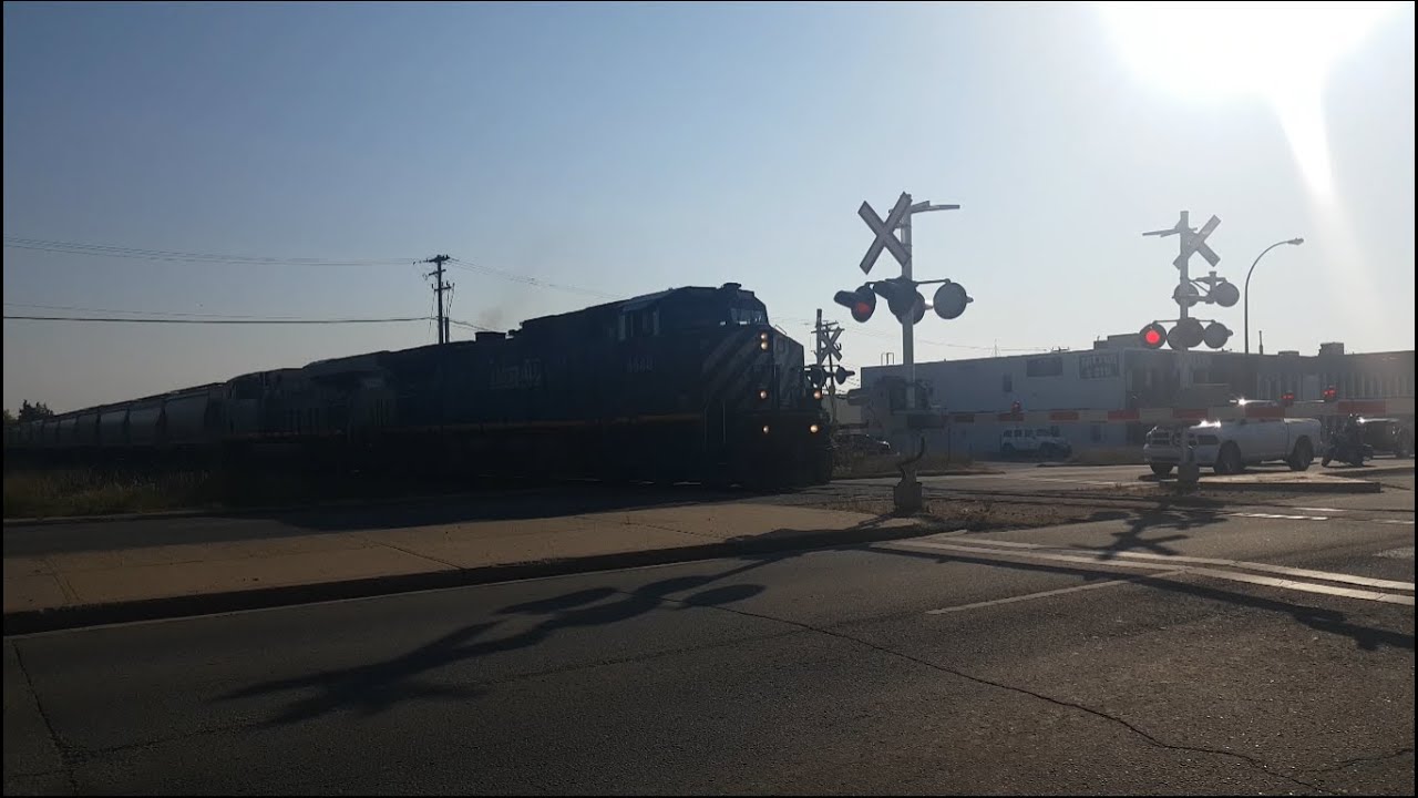 BCOL 4648 Leads A Northbound Local With 14 Sand Cars And A Horn Battle