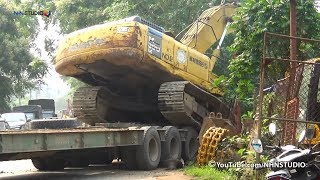 Loading Transporting The Broken Down Excavator Komatsu PC300 By Self Loader Truck Isuzu Giga