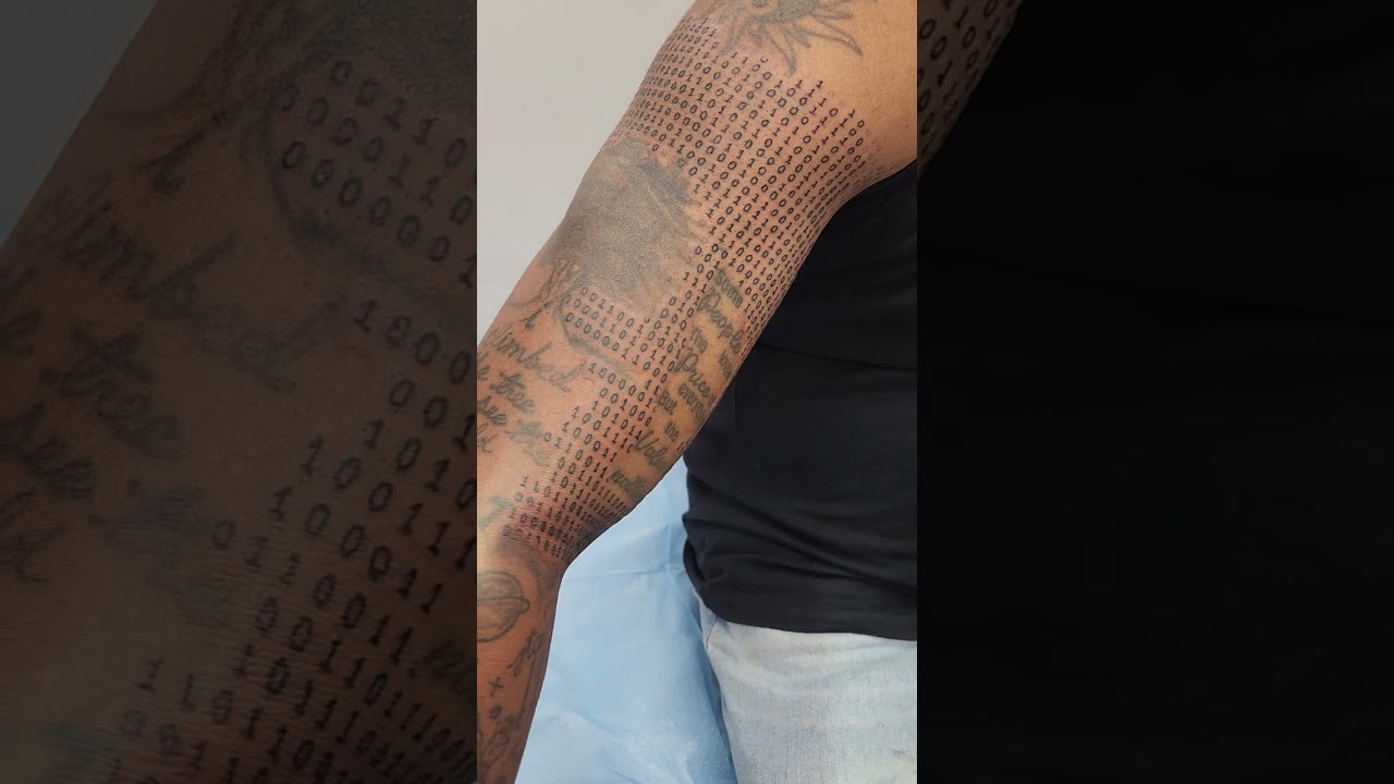 chest tattoo computer binary code