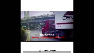 Traile container turns over at high spee on Singapore Road