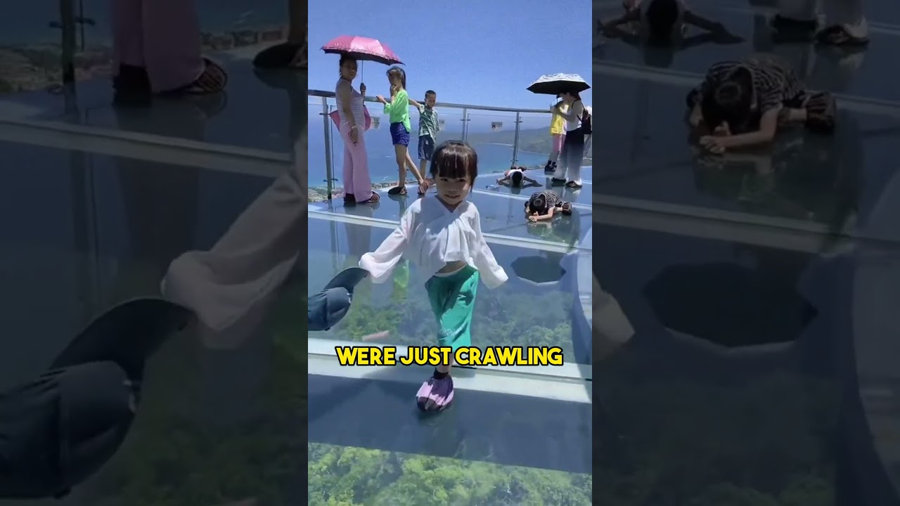 Girl walking on glass bridge. impressive!!!